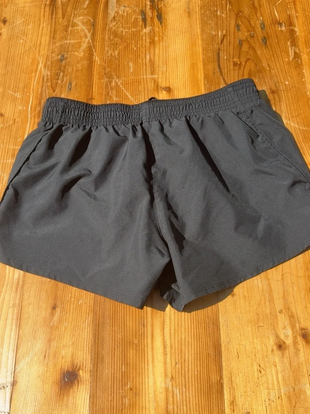 Nike Women’s Black Athletic Shorts with White Swoosh